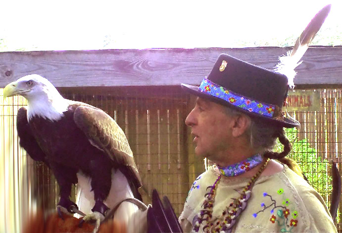 Keith Little Badger and Thunder, A Rescue Eagle The Drum People Volunteered at Wrede's Wildlife Rescue Center in Florida. The Center has since closed due to Tornado.
